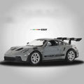 Model samochodu Porsche 911 GT3 RS w skali 1:36 – metalowy model wyścigowy z napędem typu „pull-back”, idealny do kolekcji lub na prezent dla dzieci.